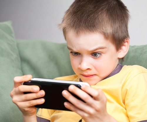 Boy playing video game
